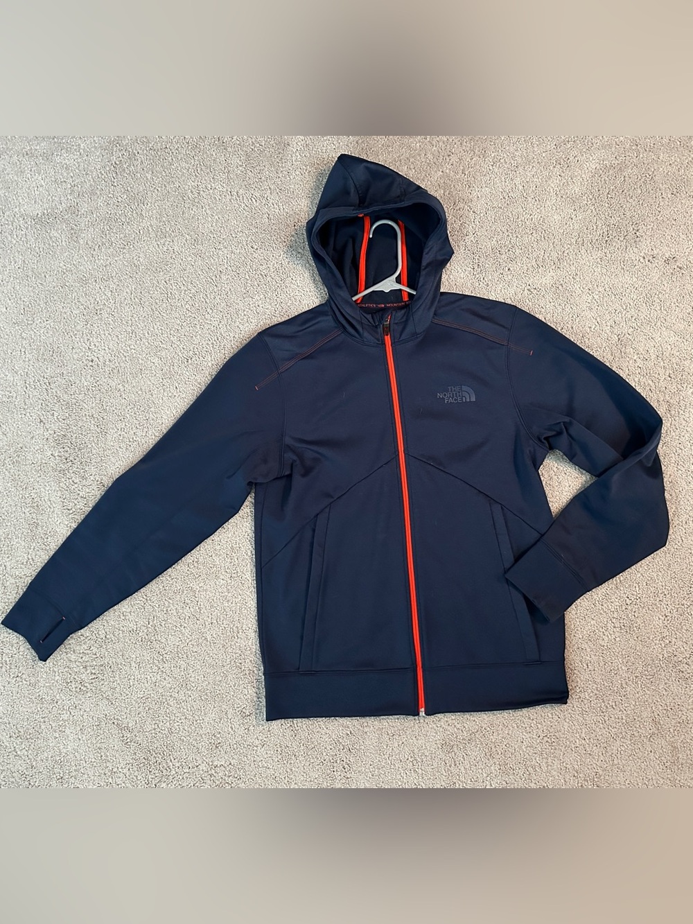 The North Face Men's Navy Blue Hooded Performance Jacket with Red Zipper